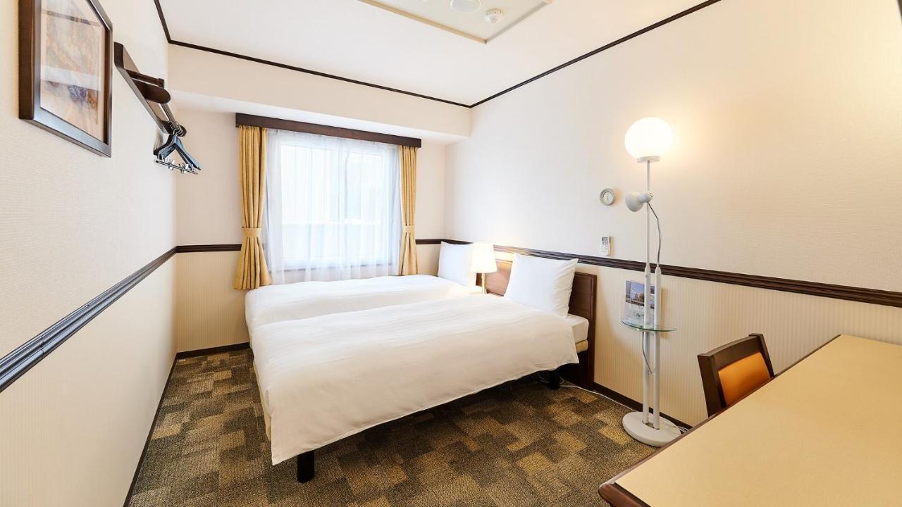טויונאקה Toyoko Inn Osaka Itami Airport מראה חיצוני תמונה