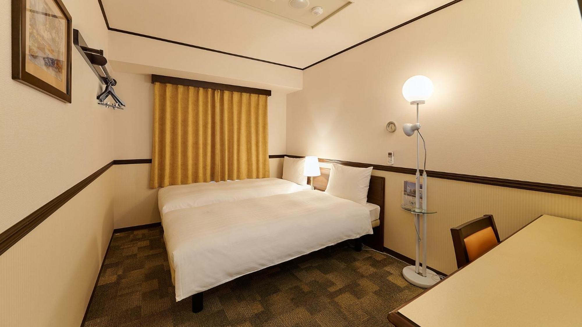 טויונאקה Toyoko Inn Osaka Itami Airport חדר תמונה