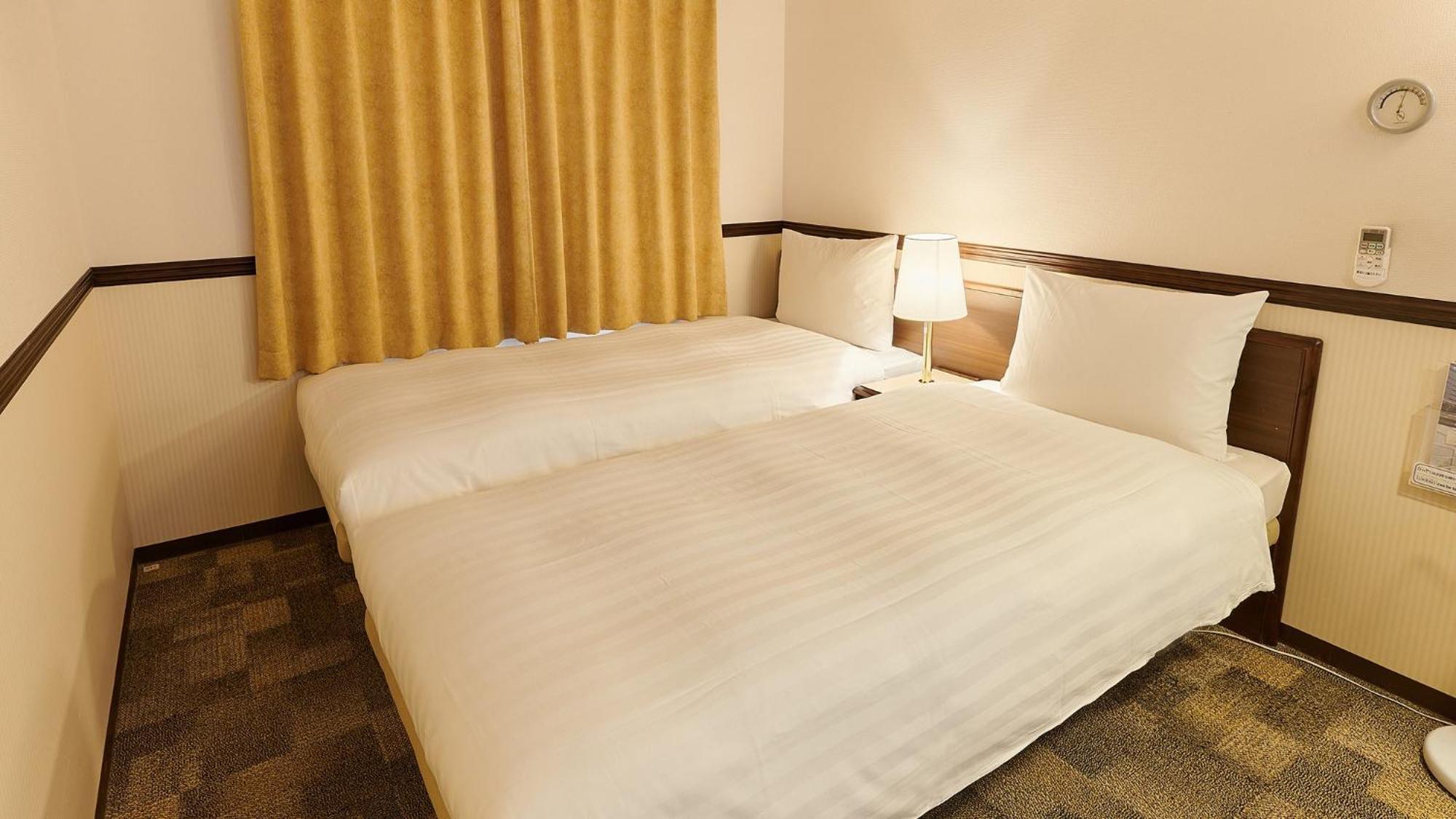 טויונאקה Toyoko Inn Osaka Itami Airport חדר תמונה