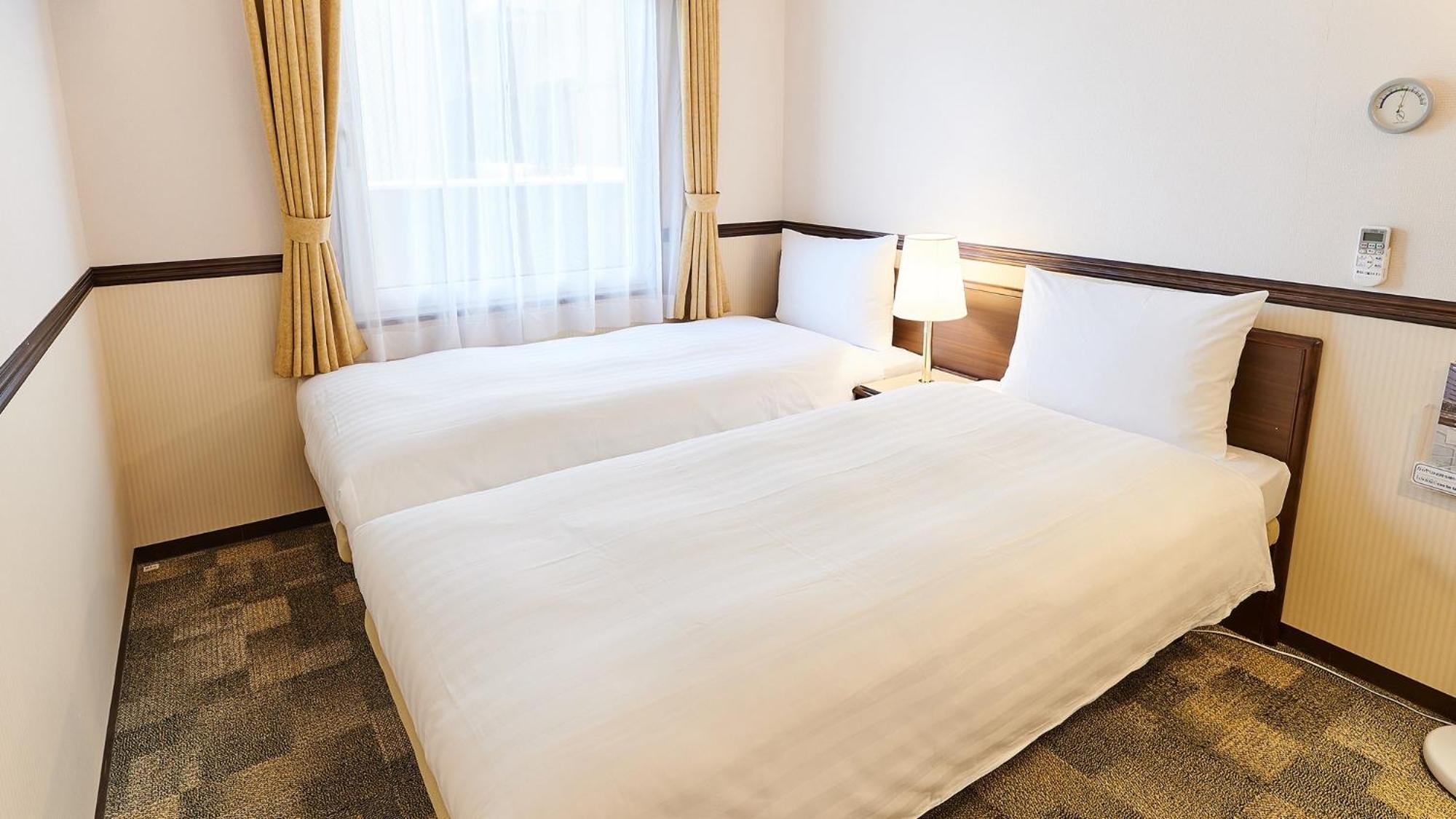 טויונאקה Toyoko Inn Osaka Itami Airport חדר תמונה